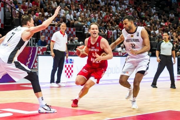 Bojan Bogdanovic of Croatia dribbling the ball during the 2020 FIBA Men's Olympic Qualifying Tournament game between Germany and Croatia at Spaladium...
