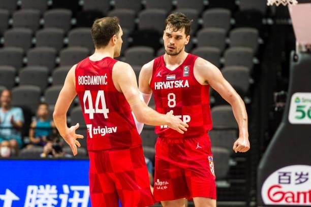 Bojan Bogdanovic and Mario Hezonja of Croatia reacting during the 2020 FIBA Men's Olympic Qualifying Tournament game between Germany and Croatia at...