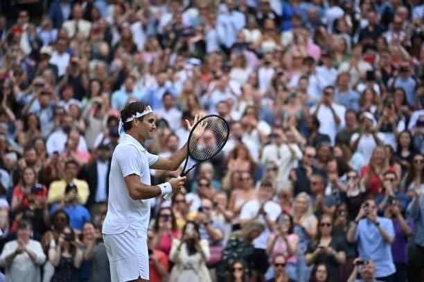 Switzerland's Roger Federer celebrates his victory over Britain's Cameron Norrie during their men's singles third round match on the sixth day of the...