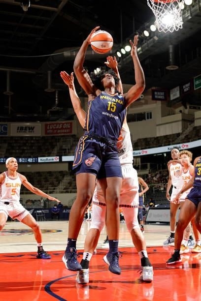 Teaira McCowan of the Indiana Fever grabs the rebound against the Connecticut Sun on July 3, 2021 at Indiana Farmers Coliseum in Indianapolis,...