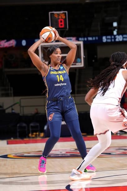 Jantel Lavender of the Indiana Fever looks to pass the ball against the Connecticut Sun on July 3, 2021 at Indiana Farmers Coliseum in Indianapolis,...