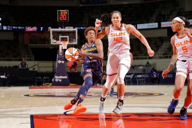 Danielle Robinson of the Indiana Fever drives to the basket against the Connecticut Sun on July 3, 2021 at Indiana Farmers Coliseum in Indianapolis,...