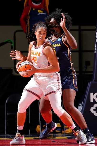 Brionna Jones of the Connecticut Sun handles the ball against the Indiana Fever on July 3, 2021 at Indiana Farmers Coliseum in Indianapolis, Indiana....