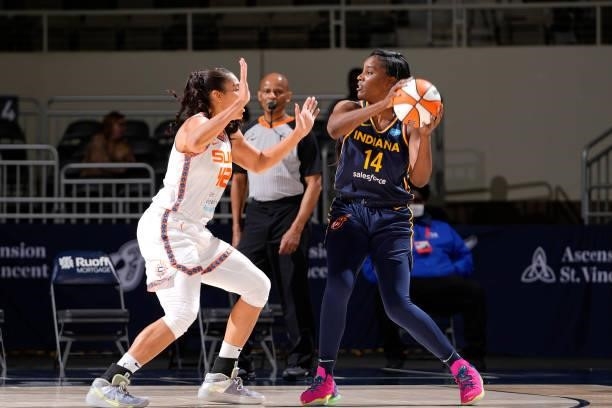 Jantel Lavender of the Indiana Fever handles the ball against the Connecticut Sun on July 3, 2021 at Indiana Farmers Coliseum in Indianapolis,...