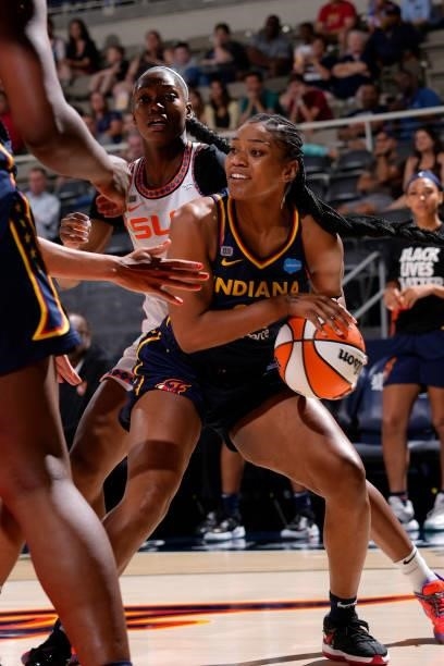 Victoria Vivians of the Indiana Fever handles the ball against the Connecticut Sun on July 3, 2021 at Indiana Farmers Coliseum in Indianapolis,...