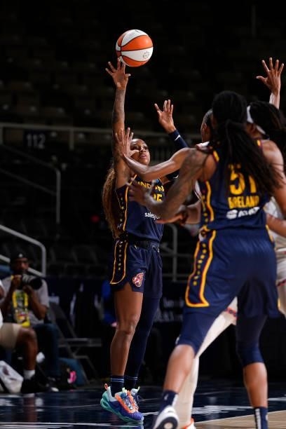 Tiffany Mitchell of the Indiana Fever passes the ball against the Connecticut Sun on July 3, 2021 at Indiana Farmers Coliseum in Indianapolis,...