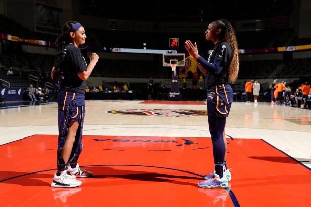 Kysre Gondrezick and Tiffany Mitchell of the Indiana Fever get pumped before the game against the Connecticut Sun on July 3, 2021 at Indiana Farmers...