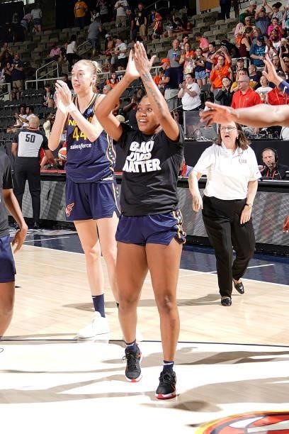 Victoria Vivians of the Indiana Fever cheers to the crowd after the game against the Connecticut Sun on July 3, 2021 at Indiana Farmers Coliseum in...