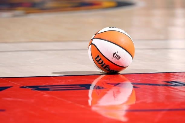 The official basketball of the WNBA sits on the court during the game between the Connecticut Sun and the Indiana Fever on July 3, 2021 at Indiana...