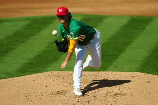 Cole Irvin of the Oakland Athletics pitches during the game between the Boston Red Sox and the Oakland Athletics at Oakland Coliseum on Saturday,...