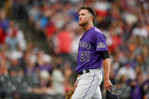 Kyle Freeland of the Colorado Rockies walks off the field after a scoreless first inning pitched against the St. Louis Cardinals at Coors Field on...
