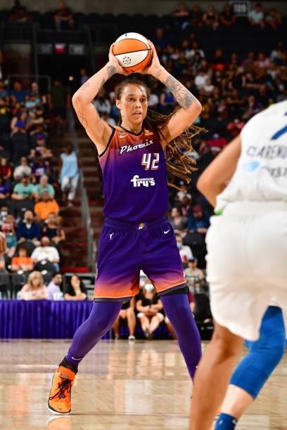 Brittney Griner of the Phoenix Mercury looks to pass the ball during the game against the Minnesota Lynx on July 3, 2021 at the Phoenix Suns Arena in...