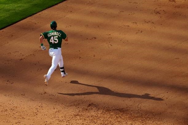 Frank Schwindel of the Oakland Athletics runs to second base after hitting a double in the sixth inning during the game between the Boston Red Sox...