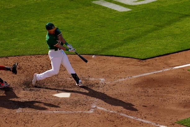 Frank Schwindel of the Oakland Athletics bats during the game between the Boston Red Sox and the Oakland Athletics at Oakland Coliseum on Saturday,...
