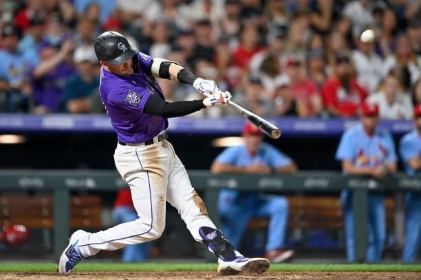 Trevor Story of the Colorado Rockies hits a seventh inning three-run homerun against the St. Louis Cardinals during a game at Coors Field on July 3,...