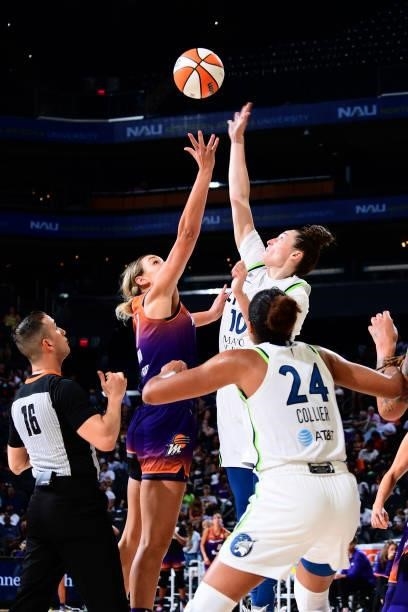 Jessica Shepard of the Minnesota Lynx reaches for a jump ball during the game against the Phoenix Mercury on July 3, 2021 at Phoenix Suns Arena in...