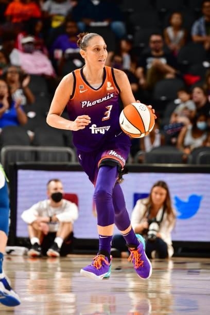 Diana Taurasi of the Phoenix Mercury dribbles the ball against the Minnesota Lynx on July 3, 2021 at the Phoenix Suns Arena in Phoenix, Arizona. NOTE...