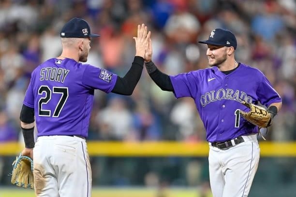 Trevor Story and Garrett Hampson of the Colorado Rockies celebrate after a 3-2 win over the St. Louis Cardinals at Coors Field on July 3, 2021 in...