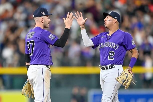 Trevor Story and Yonathan Daza of the Colorado Rockies celebrate after a 3-2 win over the St. Louis Cardinals at Coors Field on July 3, 2021 in...