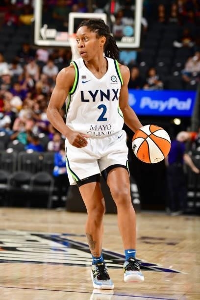 Crystal Dangerfield of the Minnesota Lynx handles the ball against the Phoenix Mercury on July 3, 2021 at the Phoenix Suns Arena in Phoenix, Arizona....