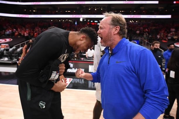 Giannis Antetokounmpo of the Milwaukee Bucks celebrates with Head Coach Mike Budenholzer after the game against the Atlanta Hawks during Game 6 of...