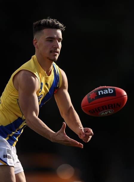 Zen Christofi of the Jets handballs during the NAB League match between Gippsland Power and the Western Jets at Morwell Football Ground on July 4,...