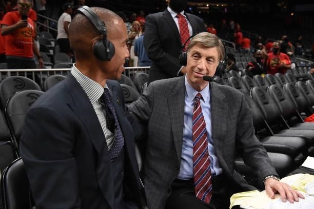Analysts Reggie Miller and Marv Albert sit court-side after the Atlanta Hawks game against the Milwaukee Bucks during Game 6 of the Eastern...