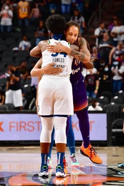 Brittney Griner of the Phoenix Mercury hugs Sylvia Fowles of the Minnesota Lynx before the game on July 3, 2021 at the Phoenix Suns Arena in Phoenix,...