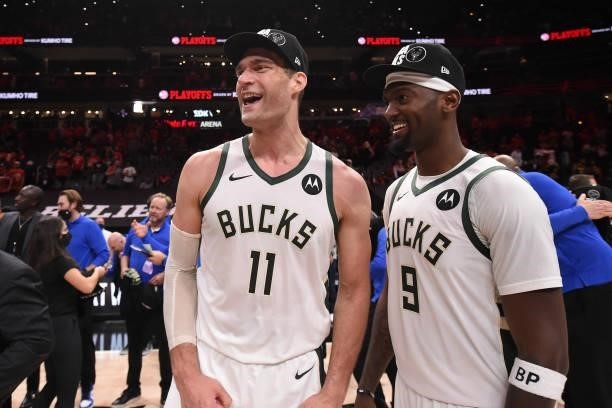 Brook Lopez Bobby Portis of the Milwaukee Bucks smile after the game against the Atlanta Hawks during Game 6 of the Eastern Conference Finals of the...