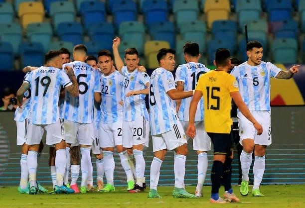 Rodrigo De Paul of Argentina celebrates with his teammates after scores his goal, during the Quarterfinal match between Argentina and Ecuador as part...