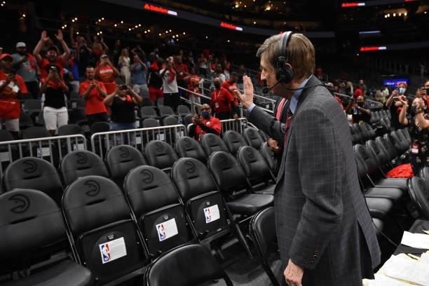 Analyst Marv Albert waves to fans after the Atlanta Hawks game against the Milwaukee Bucks during Game 6 of the Eastern Conference Finals of the 2021...