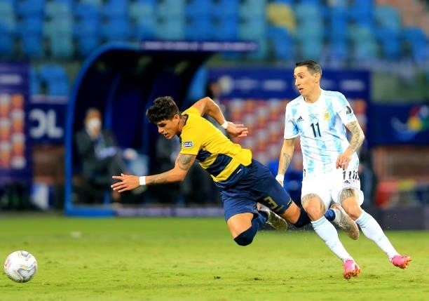 Angel Di Maria of Argentina competes for the ball with Piero Hincapie of Ecuador during the Conmebol Copa America Brazil 2021 quarter-final between...