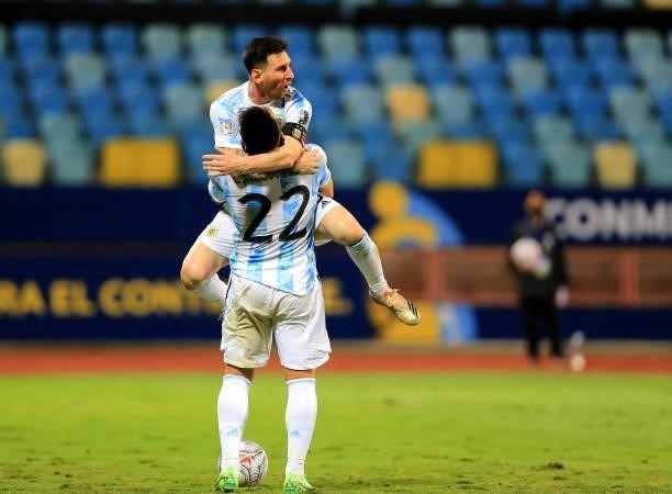 Lautaro Martinez of Argentina celebrates with his team mates Lionel Messi after scores his goal during the Conmebol Copa America Brazil 2021...