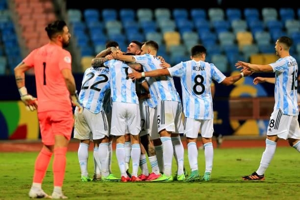 Lautaro Martinez of Argentina celebrates with his team mates after scores his goal during the Conmebol Copa America Brazil 2021 quarter-final between...