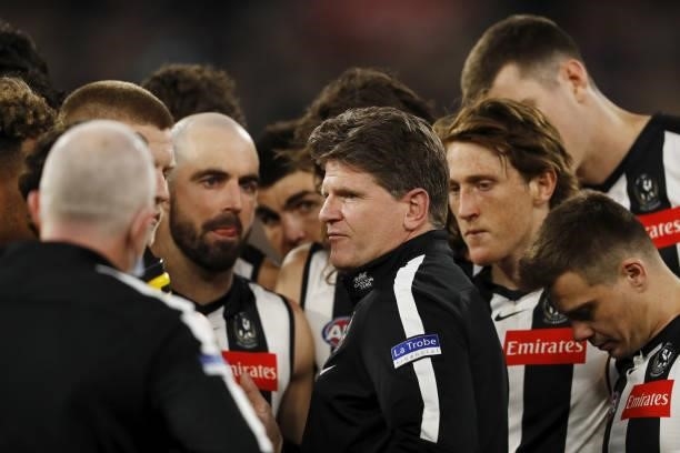 Robert Harvey, Caretaker Coach of the Magpies addresses his players during the 2021 AFL Round 16 match between the Collingwood Magpies and the St...