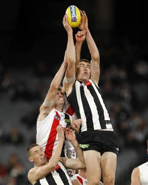 Mason Cox of the Magpies, Dougal Howard of the Saints, Paddy Ryder of the Saints and Darcy Cameron of the Magpies compete for the ball during the...
