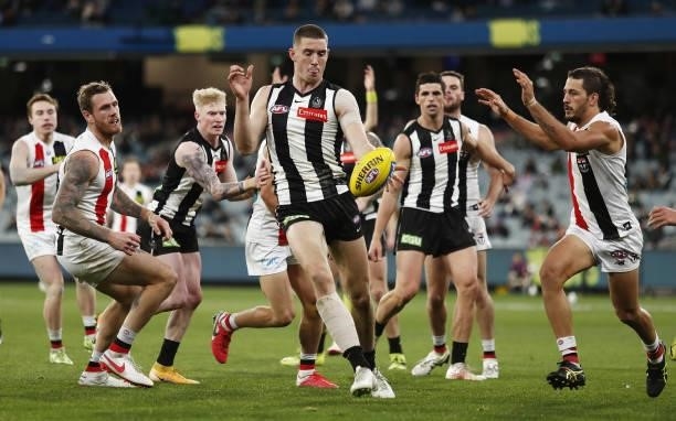 Darcy Cameron of the Magpies kicks the ball during the 2021 AFL Round 16 match between the Collingwood Magpies and the St Kilda Saints at the...