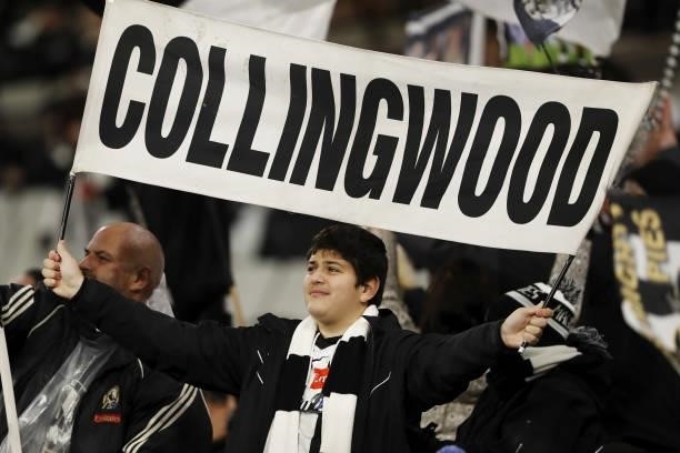 Collingwood fan celebrates during the 2021 AFL Round 16 match between the Collingwood Magpies and the St Kilda Saints at the Melbourne Cricket Ground...
