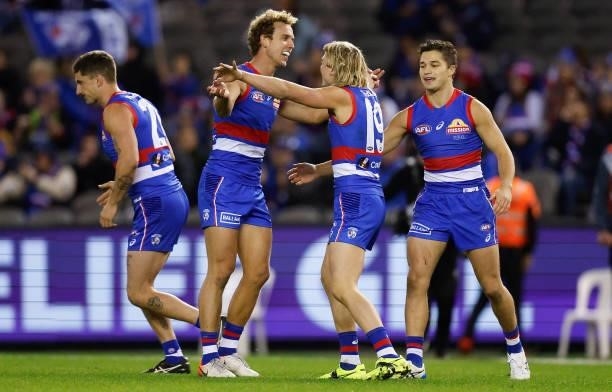 Cody Weightman and Mitch Wallis of the Bulldogs celebrate during the 2021 AFL Round 16 match between the Western Bulldogs and the North Melbourne...