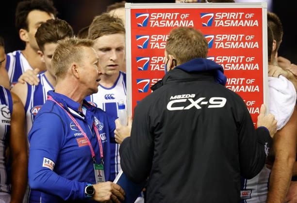 David Noble, Senior Coach of the Kangaroos addresses his players during the 2021 AFL Round 16 match between the Western Bulldogs and the North...