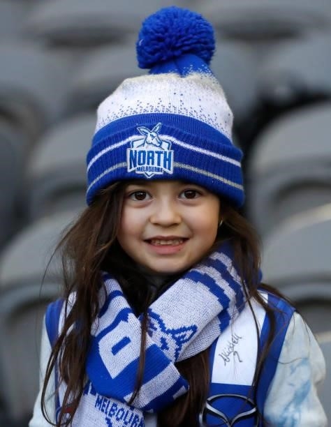 Young Kangaroos fan is seen during the 2021 AFL Round 16 match between the Western Bulldogs and the North Melbourne Kangaroos at Marvel Stadium on...