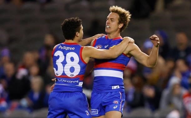Riley Garcia and Mitch Wallis of the Bulldogs celebrate during the 2021 AFL Round 16 match between the Western Bulldogs and the North Melbourne...