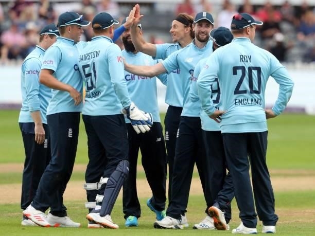 England's Tom Curran celebrates dismissing Sri Lanka's Chamika Karunaratne during the third one-day international between England and Sri Lanka at...