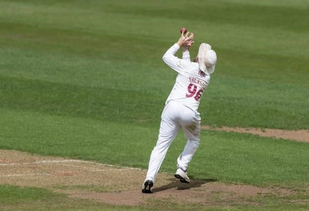 Charlie Thurston of Northamptonshire takes a catch to dismiss Gary Ballance of Yorkshire during day one of the LV= Insurance County Championship...