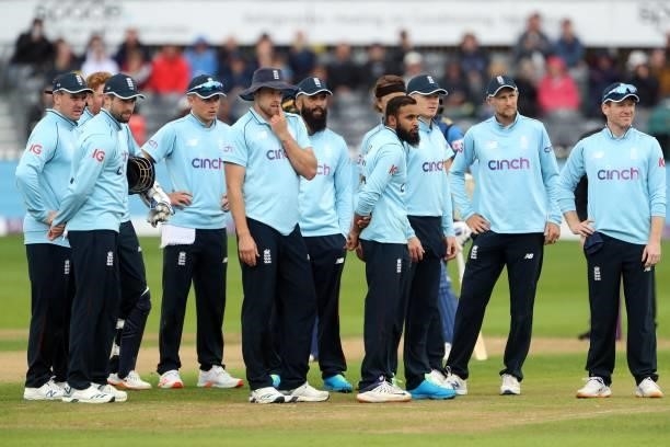 ENgland players await a review decision after England's Jonny Bairstow celebrates dismissed Sri Lanka's Dushmantha Chameera during the third one-day...