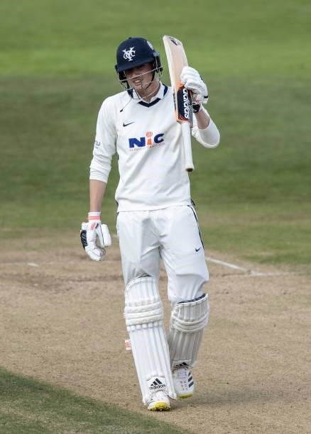 George Hill of Yorkshire acknowledges the applause on reaching his half-century during day one of the LV= Insurance County Championship match between...
