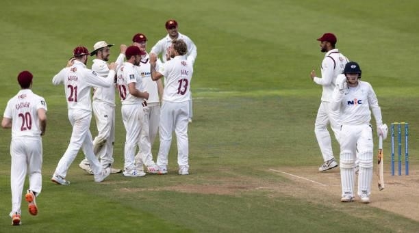 Gareth Berg of Northamptonshire celebrates after taking the wicket of Dominic Bess of Yorkshire caught behind by Ricardo Vasconcelos of...