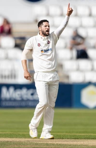 Wayne Parnell of Northamptonshire celebrates with his team mates after taking the wicket of Jordan Thompson of Yorkshire during day one of the LV=...