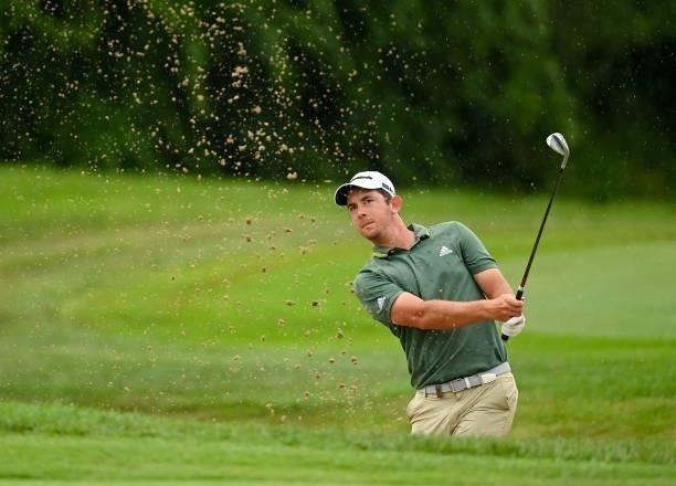 Kilkenny , Ireland - 4 July 2021; Lucas Herbert of Australia chips out of the bunker on the 16th hole during day four of the Dubai Duty Free Irish...