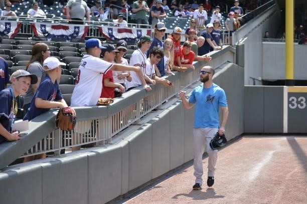 Anthony Bass of the Florida Marlins greets fans before the game against the Atlanta Braves at Truist Park on July 4, 2021 in Atlanta, Georgia.